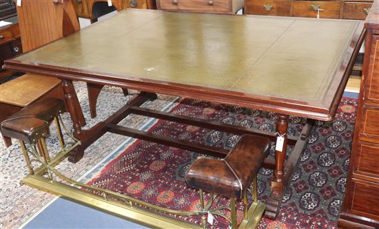 A 19th century mahogany library table with tooled green leather top W.194cm